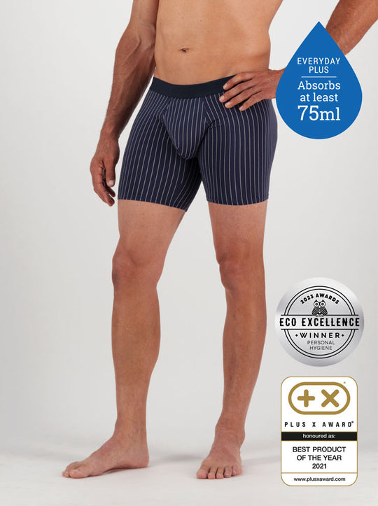 Confitex for Men leakproof long trunks for moderate bladder leakage in navy blue with a grey pinstripe .